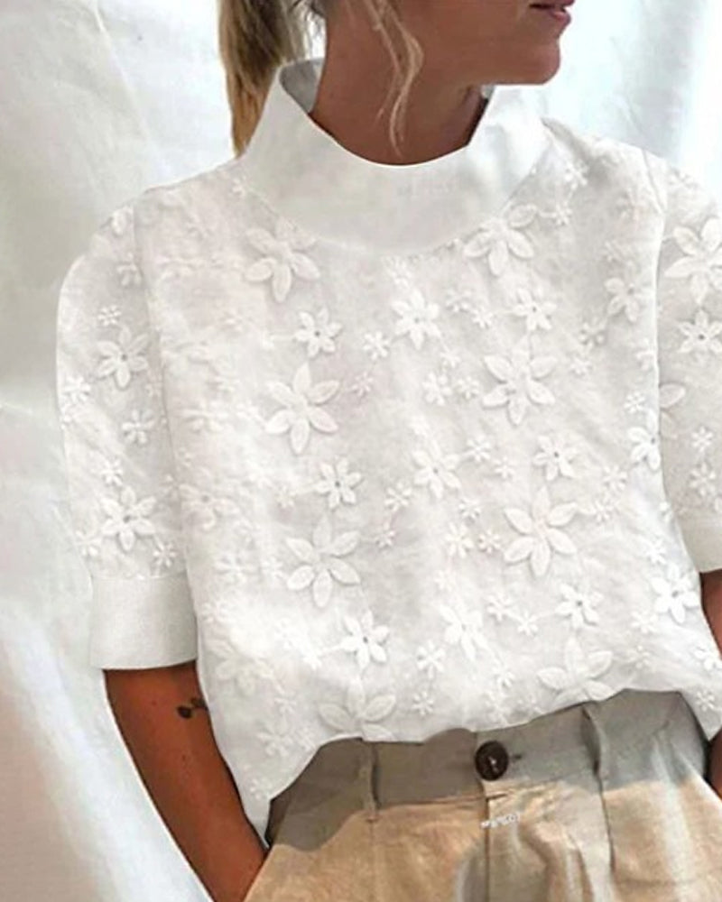 Ronja | Pull avec broderie et col montant uni